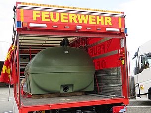 Vielzweckfass grün in Feuerwehrauto